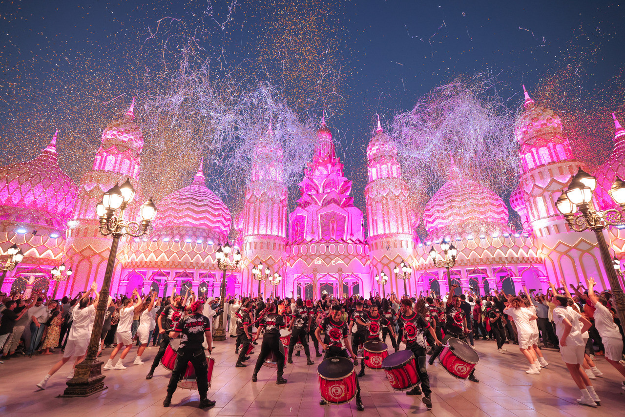 Experience a lively celebration at Global Village where dazzling lights and festive performances create an unforgettable ambiance inviting travelers to explore diverse cultures and enjoy a world of excitement.